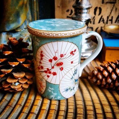 Mug à thé en porcelaine avec couvercle et infuseur